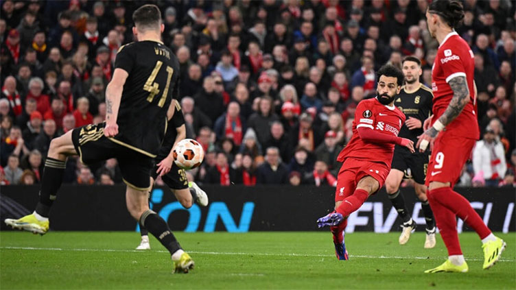 Liverpool cruise into Europa League quarters, Schick rescues Leverkusen