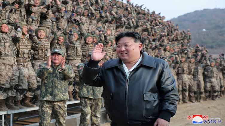 North Korea's Kim rides car given by Putin, oversees drills