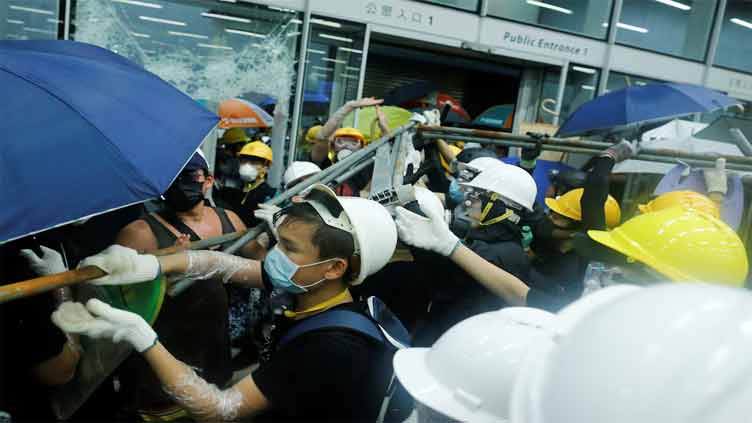 Jail terms of up to seven years for 12 who stormed Hong Kong legislature in 2019