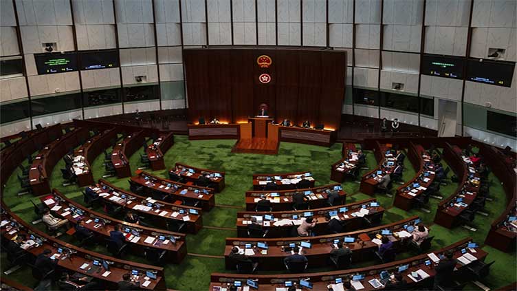  Hong Kong lawmakers unanimously approve law that gives government more power to curb dissent