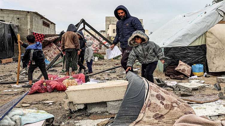 Rafah displaced shiver as thunder and rain lash tent camp