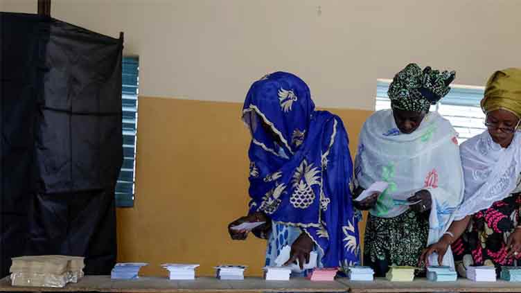 Senegal votes in delayed presidential election