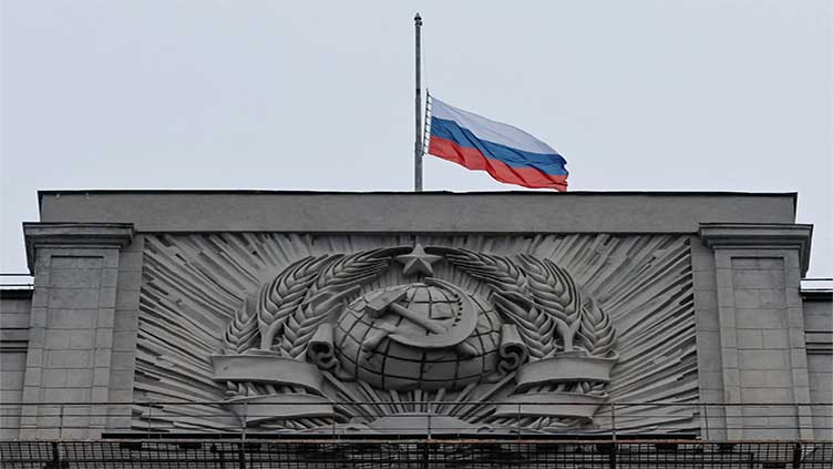 Russia lowers flag in mourning after deadly concert hall attack
