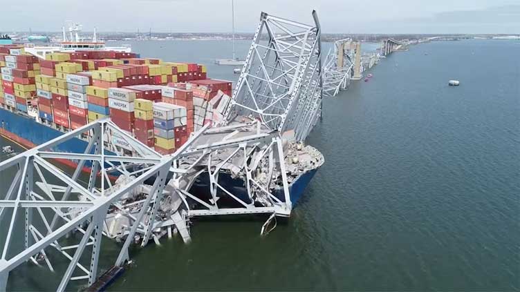 Six workers presumed dead after crippled cargo ship knocks down Baltimore bridge