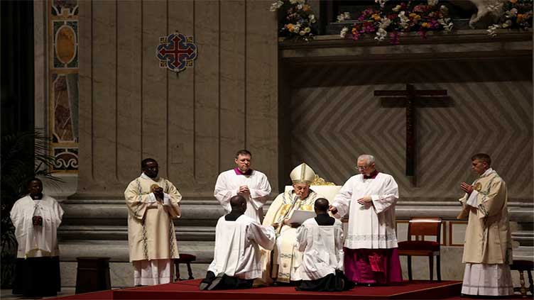 Pope soldiers through Easter Vigil after missing procession