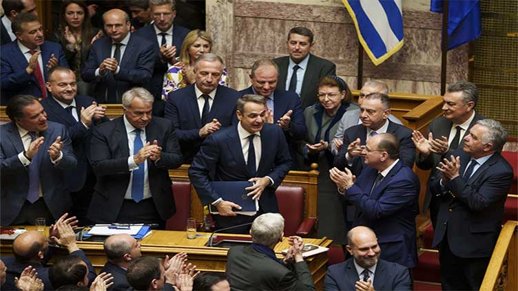 Greece's conservative government survives a no-confidence motion called over deadly rail disaster