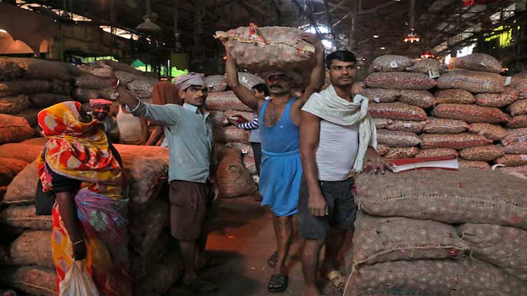 India's government lifts ban on onion exports, sets floor price
