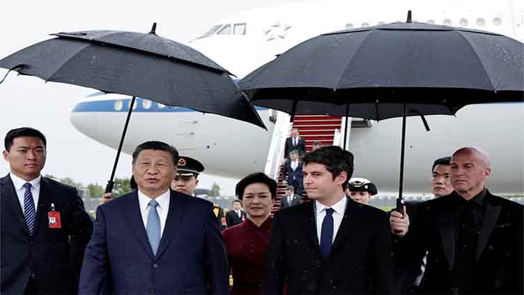 China's Xi praises French ties as Macron prepares to talk trade