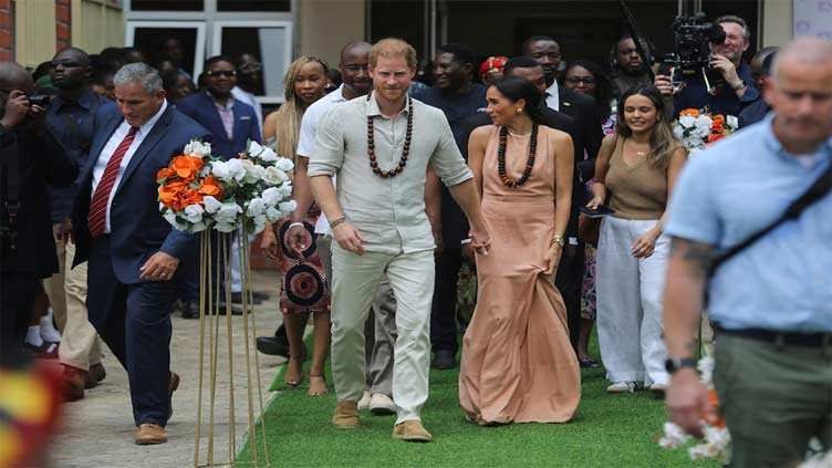 Prince Harry and Meghan talk mental health on first Nigeria visit