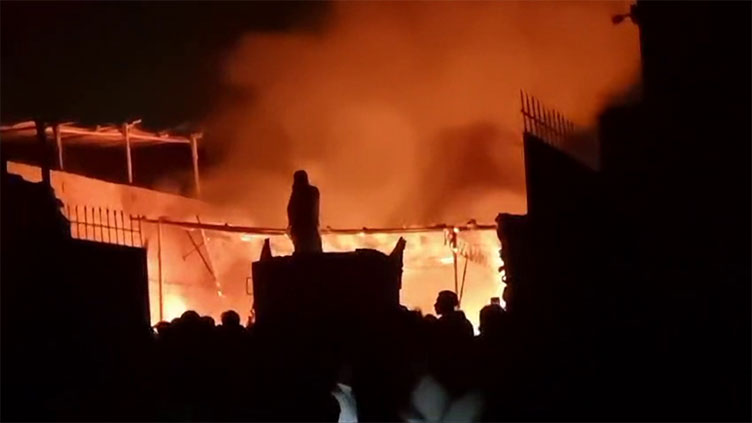 Used clothes warehouse gutted in Karachi