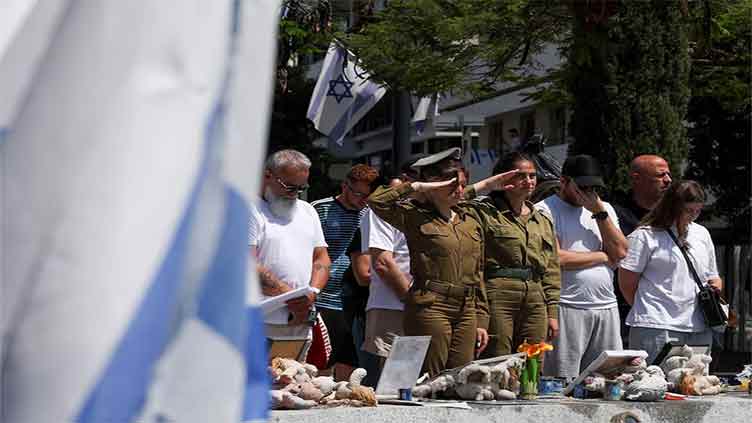 Sirens sound for the dead and for rockets on Israeli Memorial Day