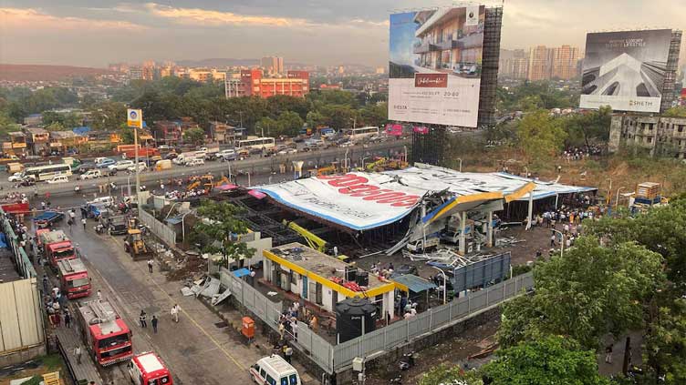 Four dead, several feared trapped under billboard in freak accident during Mumbai rainstorm