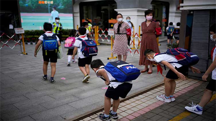 China launches campaign to halt school bullying, excessive homework