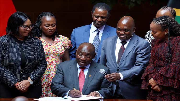 South Africa's president signs major health bill just before election