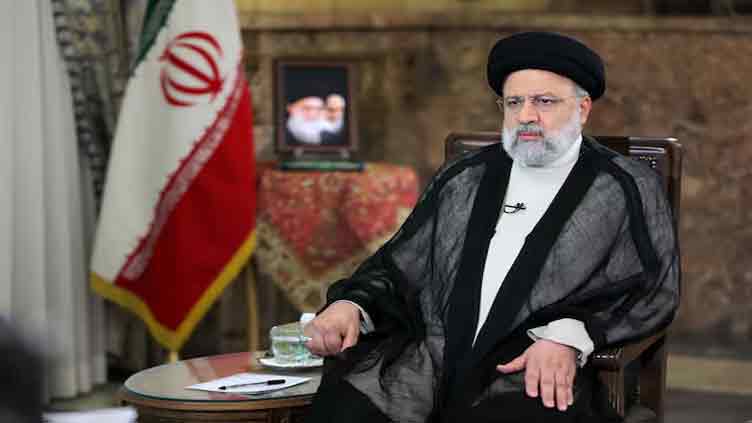 Iranian President Raisi -- Rescuers find helicopter wreckage 