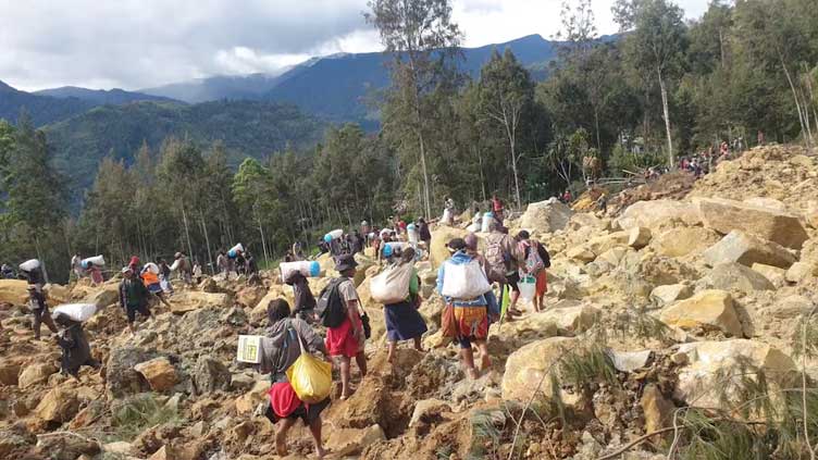 More than 300 buried in Papua New Guinea landslide, local media says