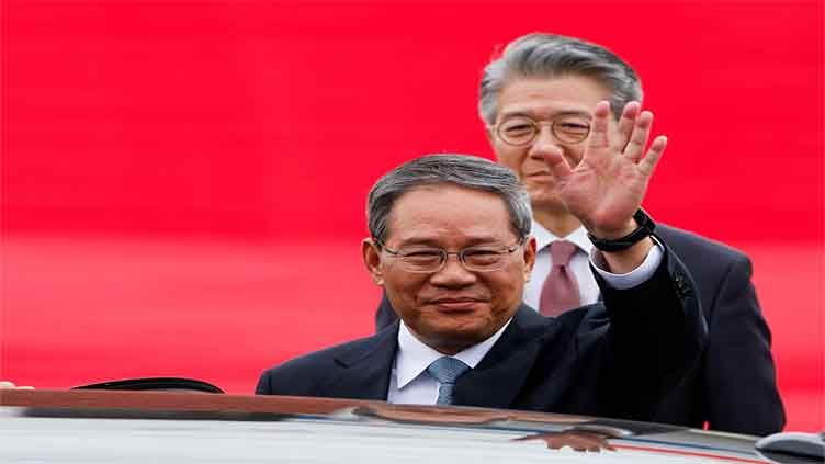 China talks security, business with US-allied South Korea, Japan