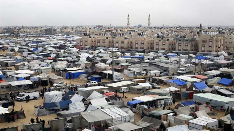 As Israel attacks Rafah, Palestinians are living in tents and searching for food