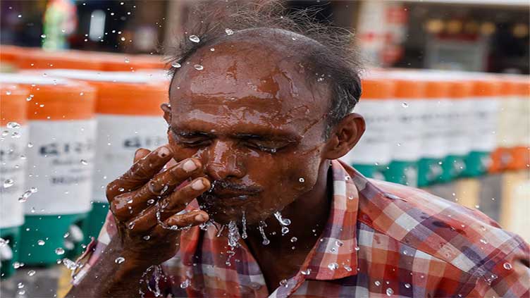 Indian capital swelters as temperature hits all-time high of 52.9 Celsius