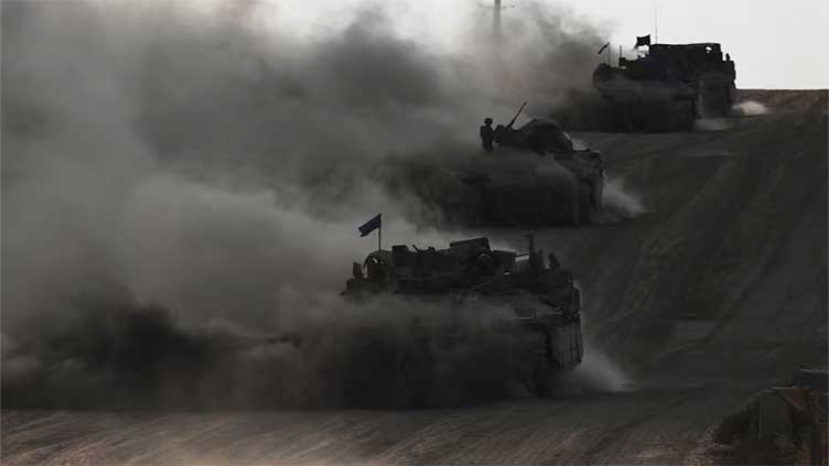 Israel seizes Gaza's entire border with Egypt, presses with raids into Rafah
