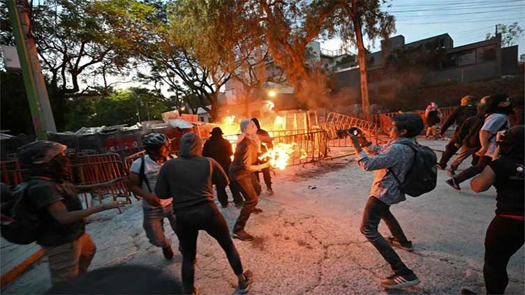 Anti-Israel protesters clash with police outside embassy in Mexico