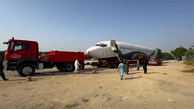 Clips of transporting retired plane by Karachi road makes round on social media