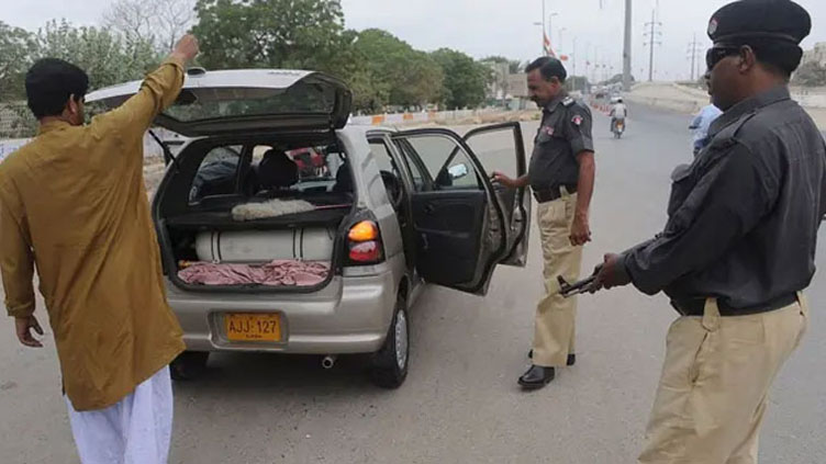 Crackdown on vehicles having tinted glass windows, fake number plates in Sindh