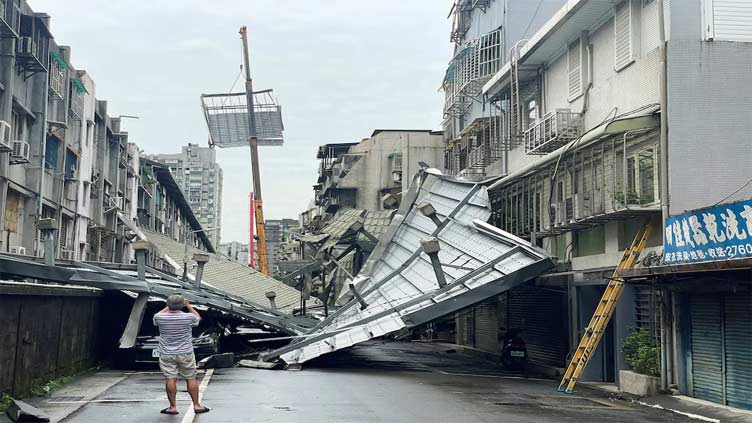 Taiwan cleans up as remnant of Typhoon Kong-rey brushes Chinese coast