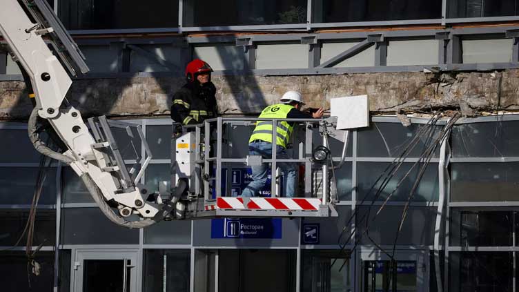 Serbia probes fatal train station roof collapse as vigil held for victims