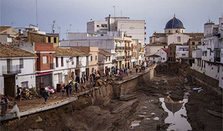 Crashing waves in a hilltop village, a night of terror from Spain's floods