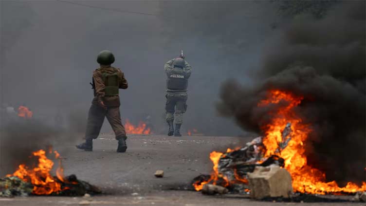 Mozambique police fire tear gas at biggest protest yet against ruling party