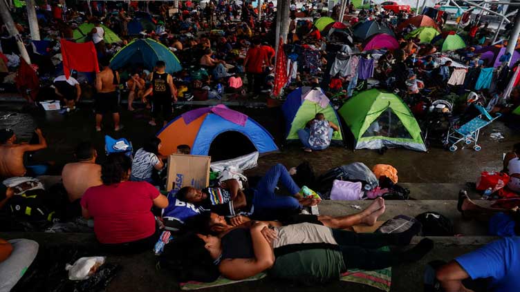 Mexico's migrant caravan breaking up after Trump victory sows uncertainty