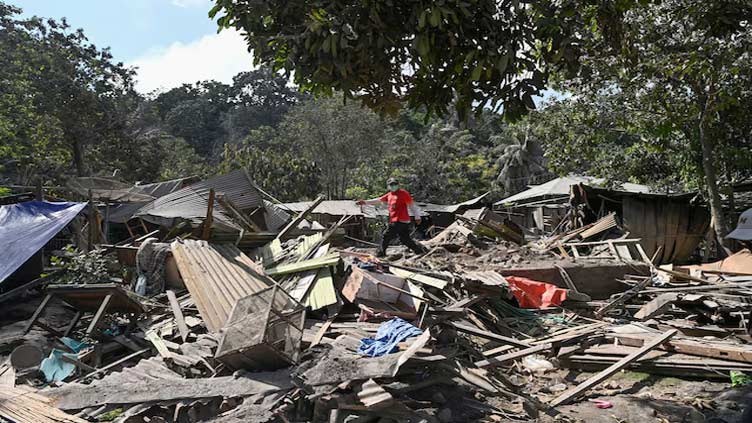 Indonesian volcano spews ash 10 km high, thousands evacuate