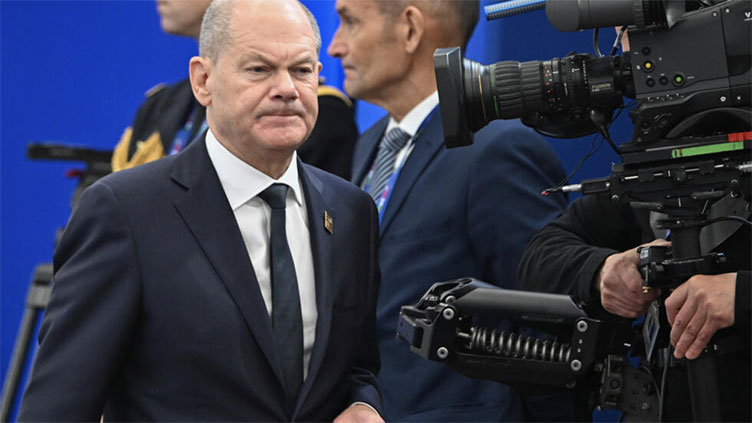 Germany's embattled Scholz open to talks on early election