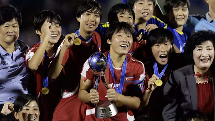 N. Korea's World Cup-winning footballers get heroes' welcome home