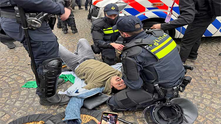 Dutch police detain 50 protesters at pro-Palestinian rally after soccer unrest