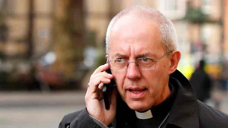 Church of England faces pressure over abuse scandal after Archbishop quits