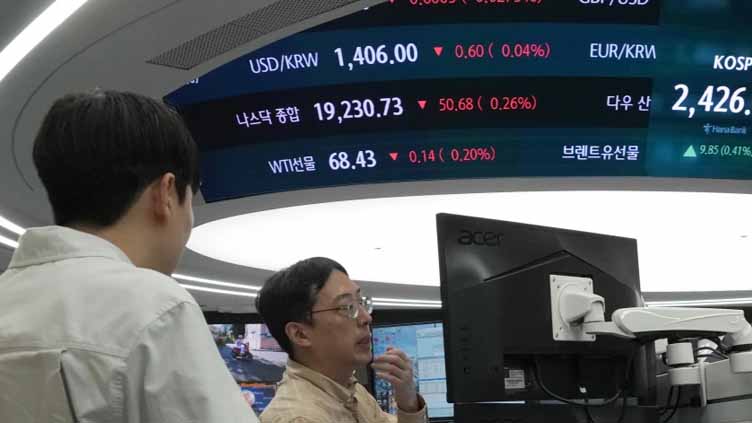 Asian shares retreat after Wall Street's mixed finish, as dollar surges