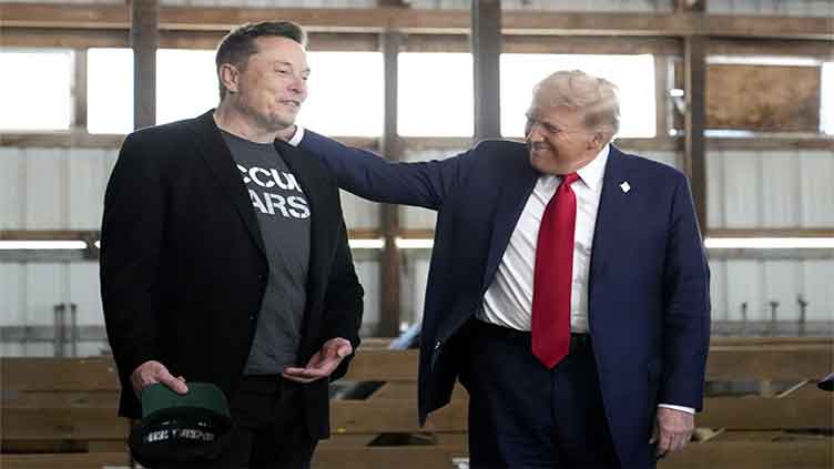 Elon Musk says he and Trump have 'mandate to delete' regulations. Ethics laws could limit Musk role