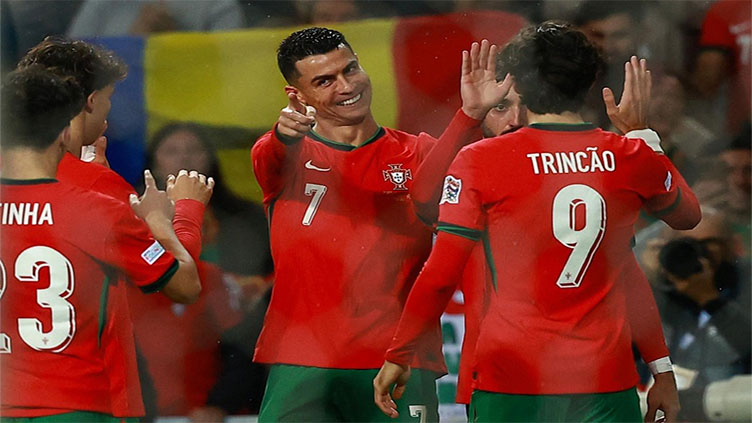 Ronaldo shines as Portugal rout Poland to reach Nations League last-eight