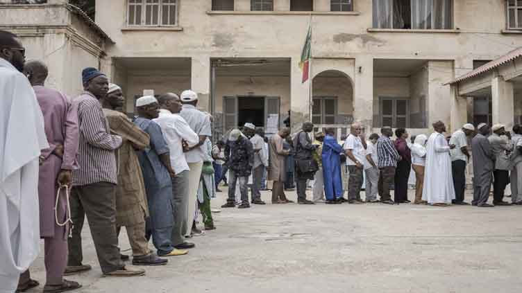 Senegal votes in election that will decide if president can carry out the reforms he promised