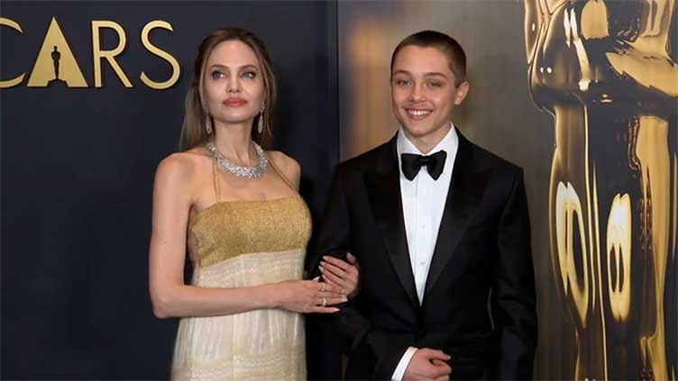 Angelina Jolie, Brad Pitt's son turns heads during red carpet appearance