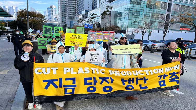 Green activists in South Korea demand tough action on plastic waste at UN talks