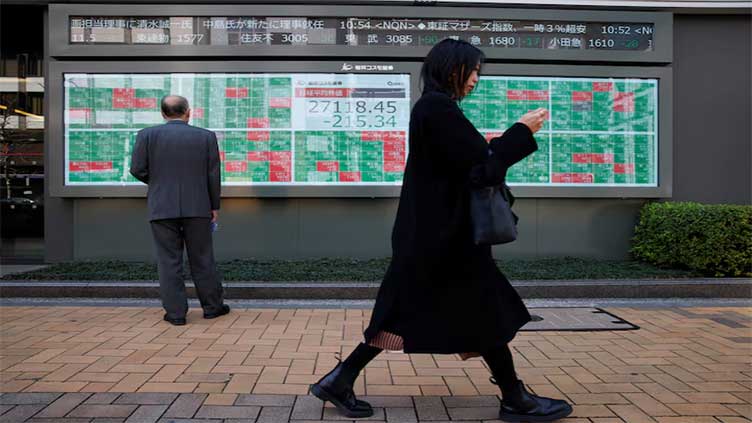 Asian shares slip, yen aims for best week in 4 months on BOJ hike bets