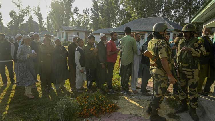 Indian Kashmir votes with rifle-toting soldiers on guard in final round