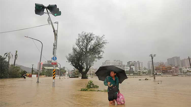 Taiwan re-opens, mopping up after Typhoon Krathon