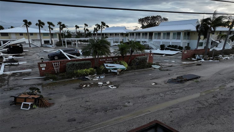 16 dead in Florida from Hurricane Milton as Trump, Harris contend over storm response