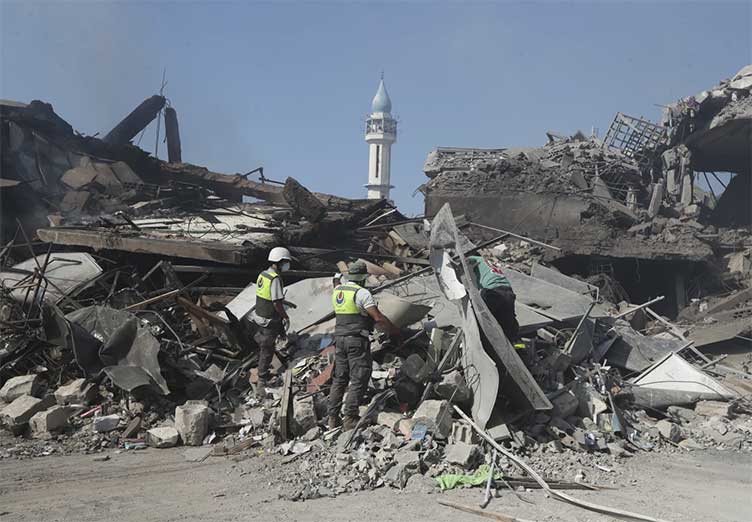 Israeli strikes kill a family of 8 in Gaza and destroy a century-old market in Lebanon