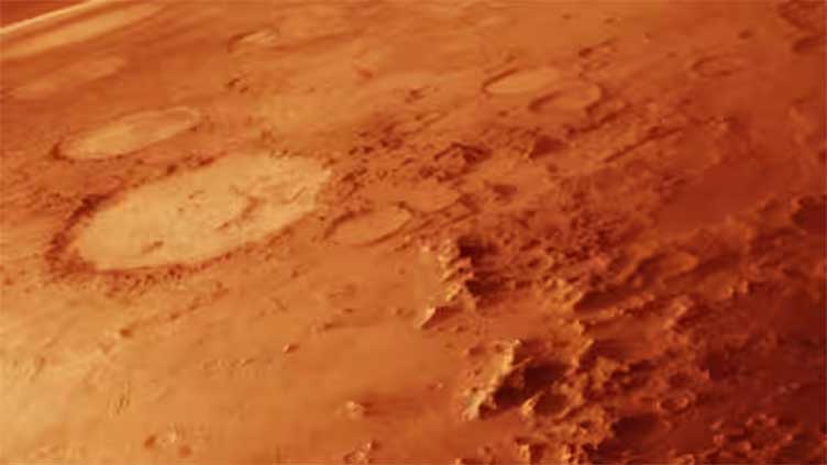 Life might thrive under frozen water on Mars, study says