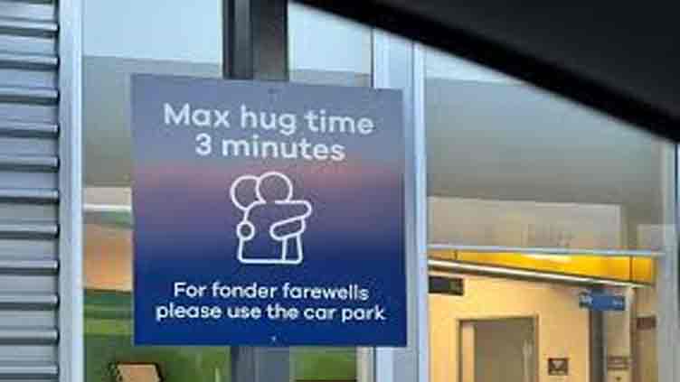 New Zealand airport limits hugging time to three minutes at drop-off zone